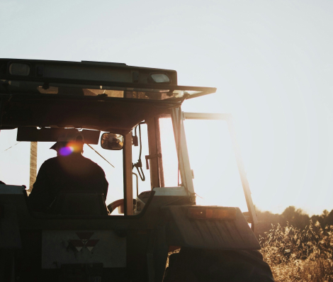 person sitting in a tractor